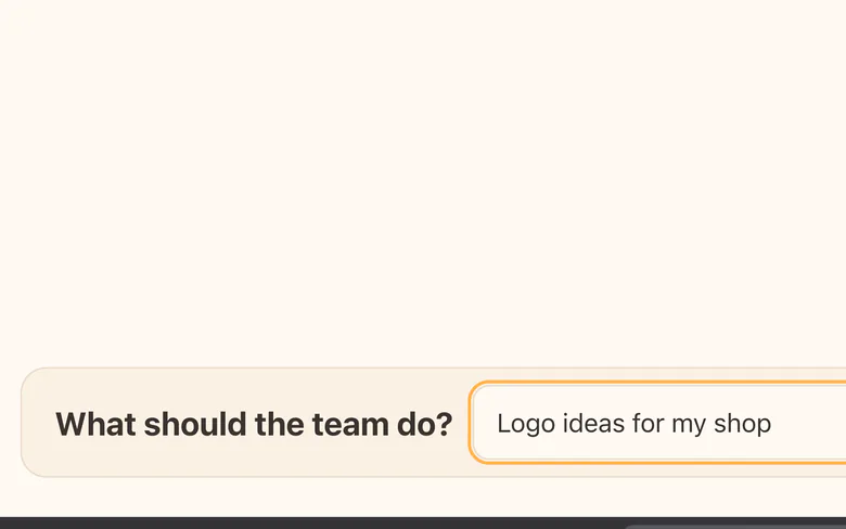 The brief box with "Logo ideas for my shop" typed in, before you press Send.